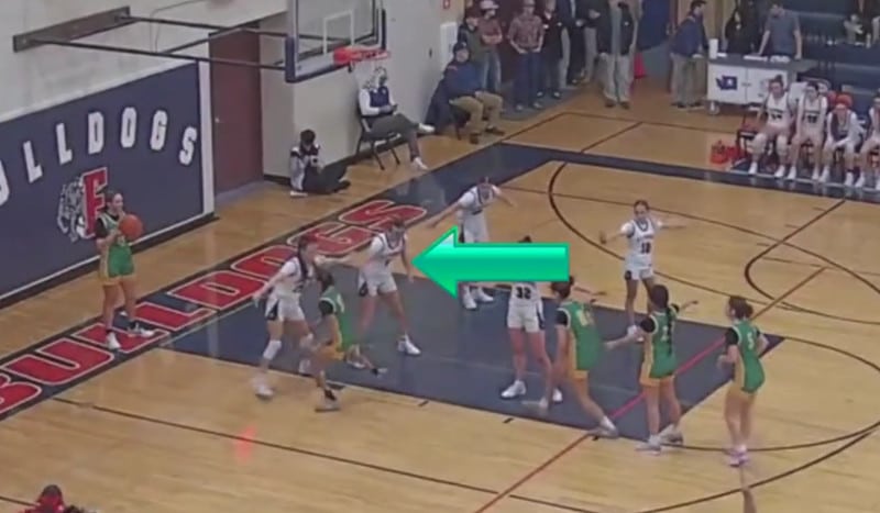 Example of a basketball recruiting video service from Chris Schieman, featuring a green arrow helping to identify the basketball player in the scene.