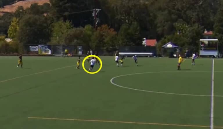 Example of my soccer recruiting Video Services, with a yellow circle around the player on the field.